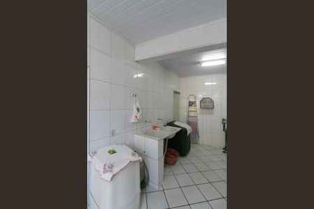 Casa à venda com 204m², 3 quartos e 2 vagas Casa à venda com 204m², 3 quartos e 2 vagasCozinha e Área de Serviço