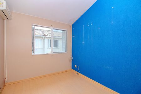 Quarto de casa de condomínio à venda com 3 quartos, 77m² em Humaitá, Porto Alegre