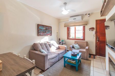 Sala de casa de condomínio para alugar com 3 quartos, 96m² em Ipanema, Porto Alegre