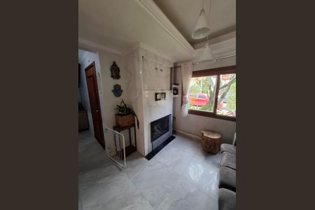 Sala de casa de condomínio à venda com 3 quartos, 150m² em Espírito Santo, Porto Alegre