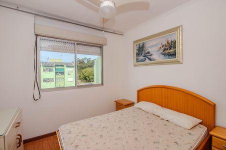Quarto 1 de apartamento para alugar com 2 quartos, 58m² em Jardim Itu, Porto Alegre