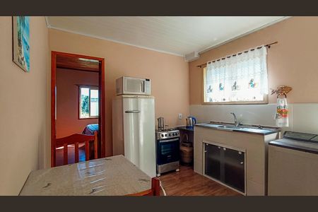 Sala/Cozinha de apartamento à venda com 2 quartos, 60m² em Vila Nova, Porto Alegre