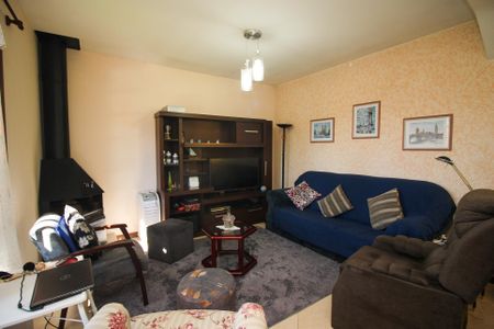 Sala de casa à venda com 3 quartos, 220m² em Tristeza, Porto Alegre