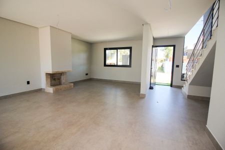 Sala de casa de condomínio à venda com 3 quartos, 140m² em Hípica, Porto Alegre