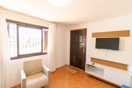 Sala de TV de casa à venda com 4 quartos, 92m² em Santo Antônio, Porto Alegre