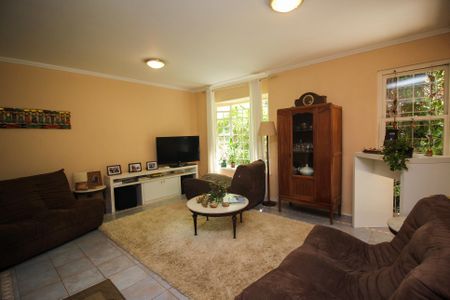 Sala de casa de condomínio à venda com 3 quartos, 133m² em Tristeza, Porto Alegre