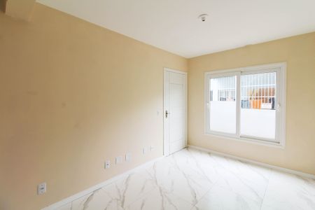 Sala de casa de condomínio à venda com 2 quartos, 89m² em Centro, Canoas