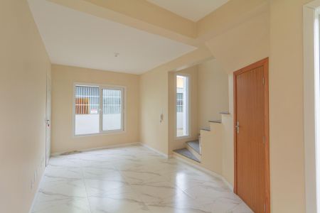 Sala de casa de condomínio à venda com 2 quartos, 89m² em Centro, Canoas