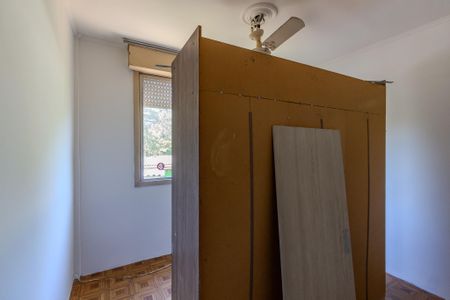 Quarto 1 de apartamento para alugar com 2 quartos, 58m² em Camaquã, Porto Alegre