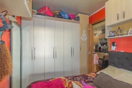 Quarto 1 de casa à venda com 3 quartos, 150m² em Guajuviras, Canoas