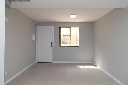 Sala de casa de condomínio à venda com 3 quartos, 64m² em Santa Tereza, Porto Alegre