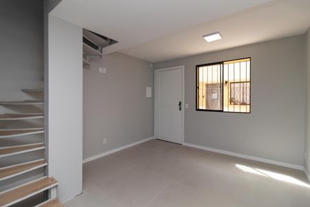 Sala de casa de condomínio à venda com 3 quartos, 64m² em Santa Tereza, Porto Alegre