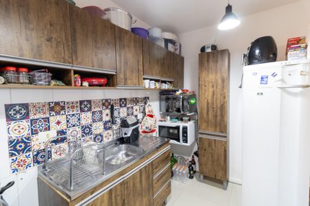 Cozinha de casa de condomínio à venda com 3 quartos, 99m² em Espírito Santo, Porto Alegre