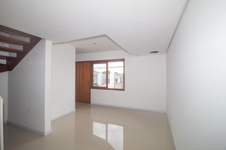 Sala de casa de condomínio à venda com 3 quartos, 99m² em Espírito Santo, Porto Alegre