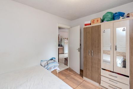 Quarto 1 de apartamento para alugar com 2 quartos, 59m² em Glória, Porto Alegre