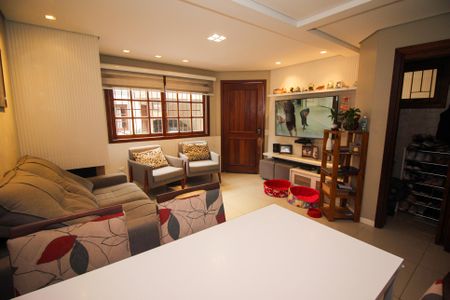 Sala de casa de condomínio à venda com 3 quartos, 129m² em Espírito Santo, Porto Alegre