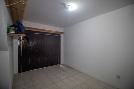 Garagem de casa de condomínio à venda com 3 quartos, 128m² em Ipanema, Porto Alegre