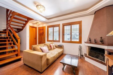 Sala de casa de condomínio à venda com 2 quartos, 175m² em Jardim Isabel, Porto Alegre