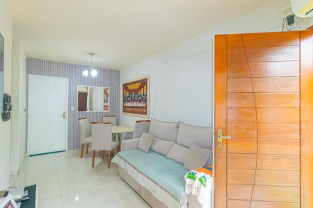 Sala de casa de condomínio à venda com 2 quartos, 42m² em Harmonia, Canoas