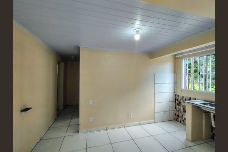 Sala - cozinha de casa de condomínio para alugar com 2 quartos, 50m² em São João do Rio Vermelho, Florianópolis