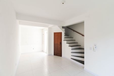 Sala de casa de condomínio à venda com 2 quartos, 89m² em Centro, Canoas