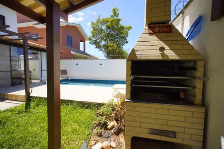 Churrasqueira de casa de condomínio para alugar com 4 quartos, 303m² em Rio Tavares Central, Florianópolis