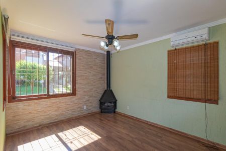 Sala de casa de condomínio para alugar com 3 quartos, 117m² em Igara, Canoas