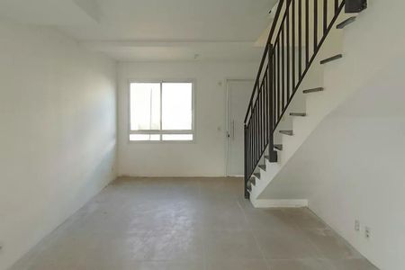 Sala de casa de condomínio para alugar com 2 quartos, 80m² em Vila Nova, Porto Alegre