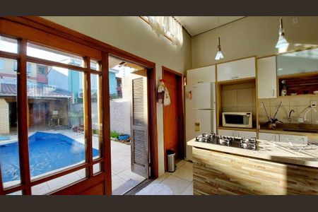 Sala / Cozinha de casa de condomínio à venda com 3 quartos, 110m² em Partenon, Porto Alegre